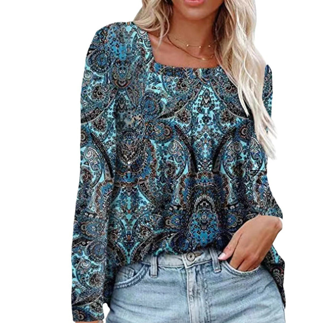 Damernas långärmad blus med fyrkantig halsringning och lekfull floral design Eva Jonsson-Eva Jonsson