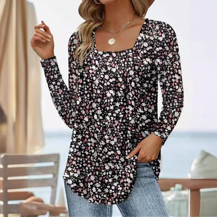 Damernas långärmad blus med fyrkantig halsringning och lekfull floral design Eva Jonsson-Eva Jonsson