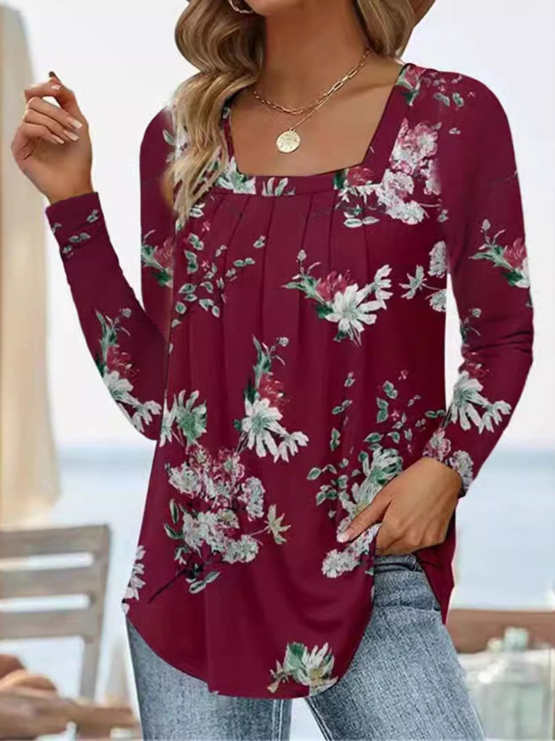 Damernas långärmad blus med fyrkantig halsringning och lekfull floral design Mirla-Eva Jonsson