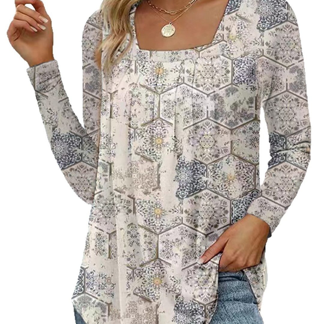 Damernas långärmad blus med fyrkantig halsringning och lekfull floral design Mirla-Eva Jonsson
