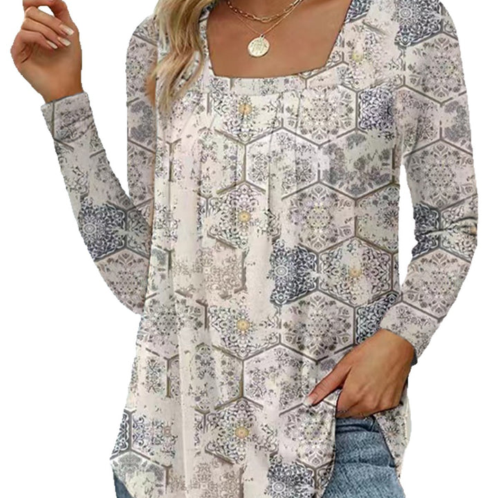 Damernas långärmad blus med fyrkantig halsringning och lekfull floral design Mirla-Eva Jonsson