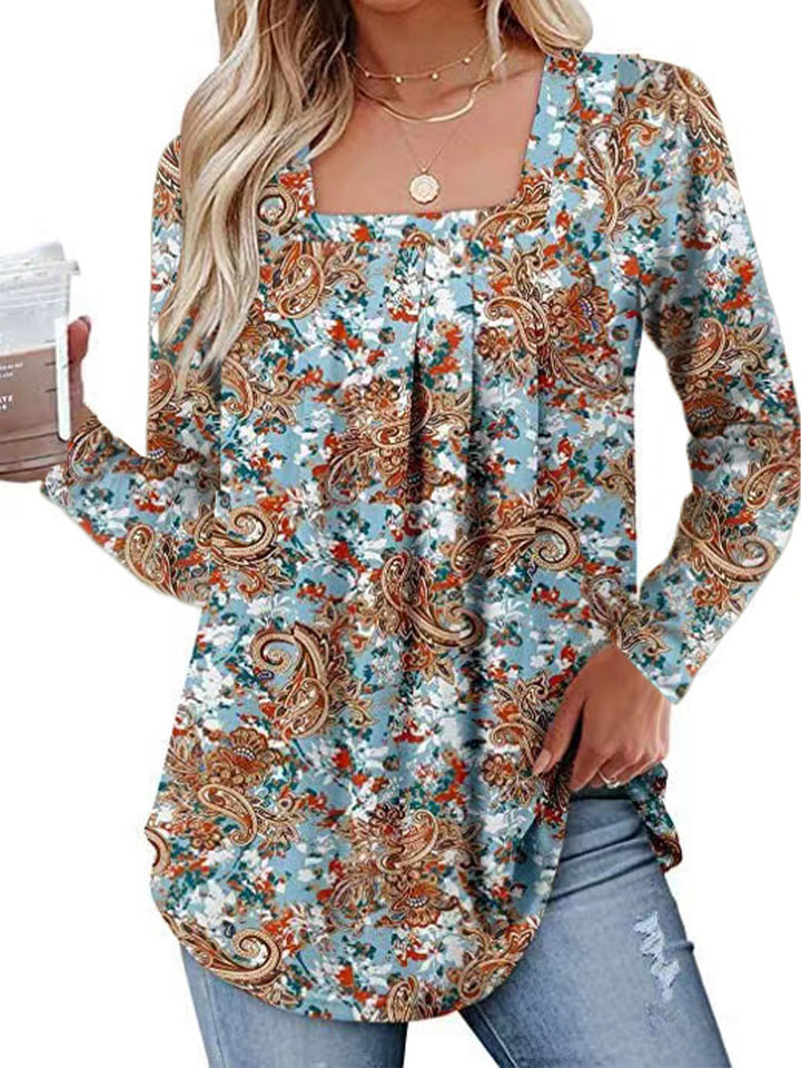 Damernas långärmad blus med fyrkantig halsringning och lekfull floral design Mirla-Eva Jonsson