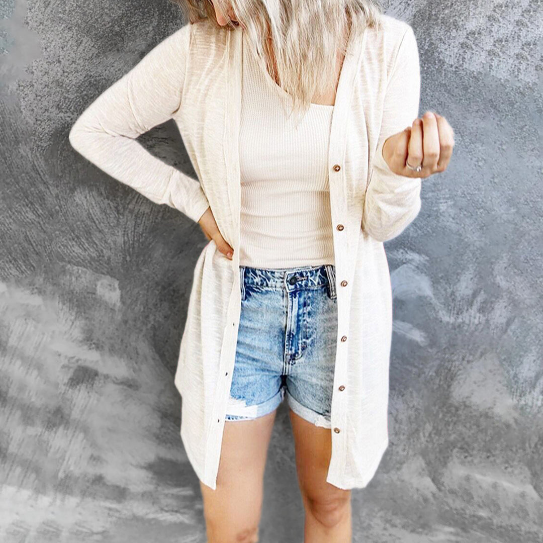 Damernas långärmad cardigan med modiga knapppdetaljer och asymmetrisk fåll Eva Jonsson-Eva Jonsson