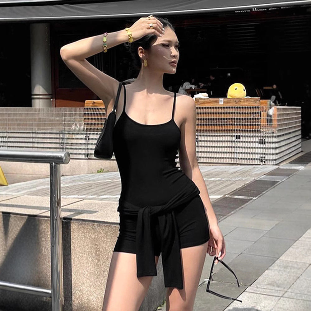Damernas långärmad jumpsuit med spaghetti stroppar och figurnära snitt Mirla-Eva Jonsson