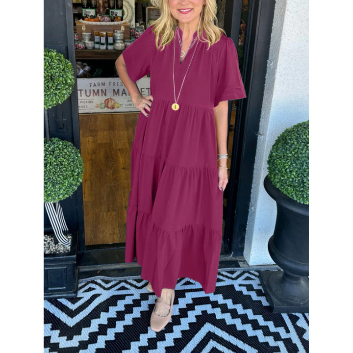 Damernas långärmad maxiklänning med V-hals och volangdetalj Eva Jonsson-Eva Jonsson