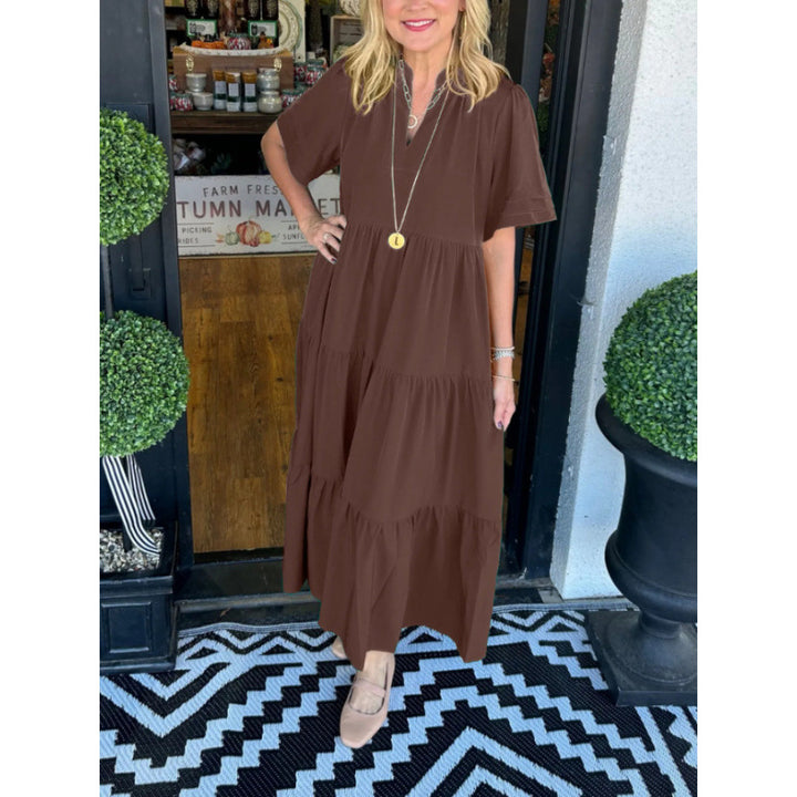 Damernas långärmad maxiklänning med V-hals och volangdetalj Eva Jonsson-Eva Jonsson