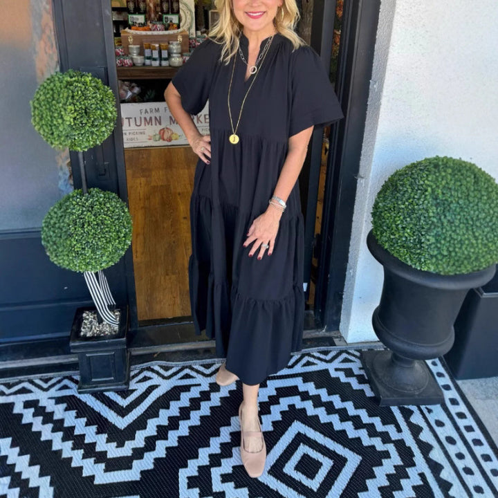 Damernas långärmad maxiklänning med V-hals och volangdetalj Eva Jonsson-Eva Jonsson