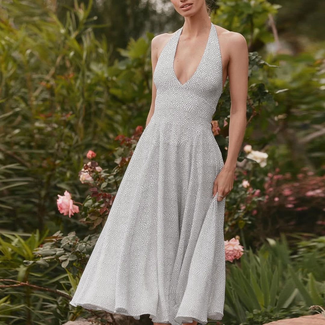 Damernas långärmad maxiklänning med djup V-halsringning och sportig halter Eva Jonsson-Eva Jonsson