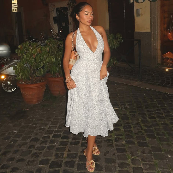 Damernas långärmad maxiklänning med djup V-halsringning och sportig halter Eva Jonsson-Eva Jonsson