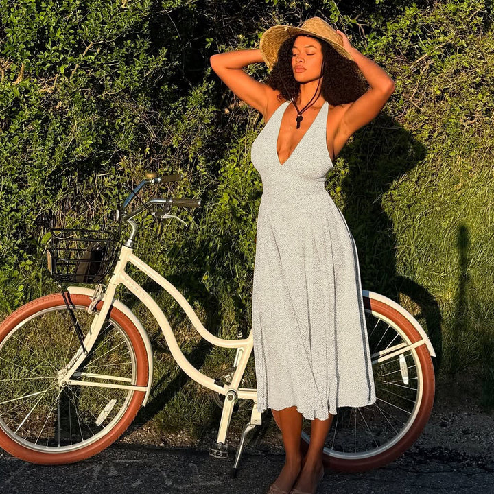 Damernas långärmad maxiklänning med djup V-halsringning och sportig halter Eva Jonsson-Eva Jonsson