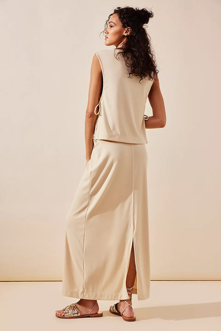 Damernas långärmad maxiklänning med elegant ryggsnitt och justerbar midjesnörning Eva Jonsson-Eva Jonsson