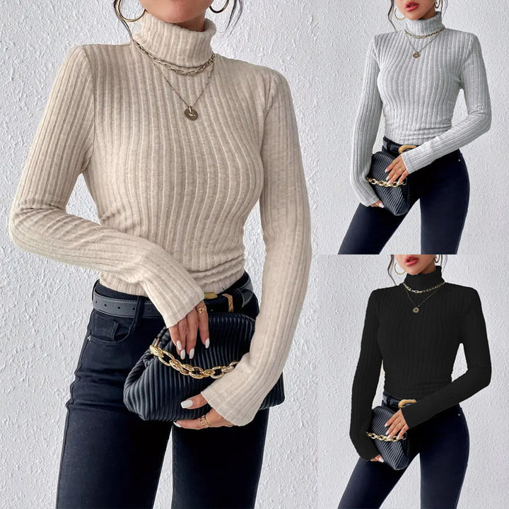 Damernas långärmad rullkrageponcho i fin ribbad stickad Eva Jonsson-Eva Jonsson