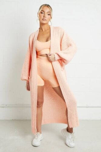 Damernas långstickad jacka med grov maskstruktur och praktiska fickor Eva Jonsson-Eva Jonsson