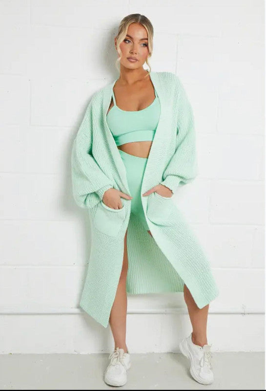 Damernas långstickad jacka med grov maskstruktur och praktiska fickor Eva Jonsson-Eva Jonsson