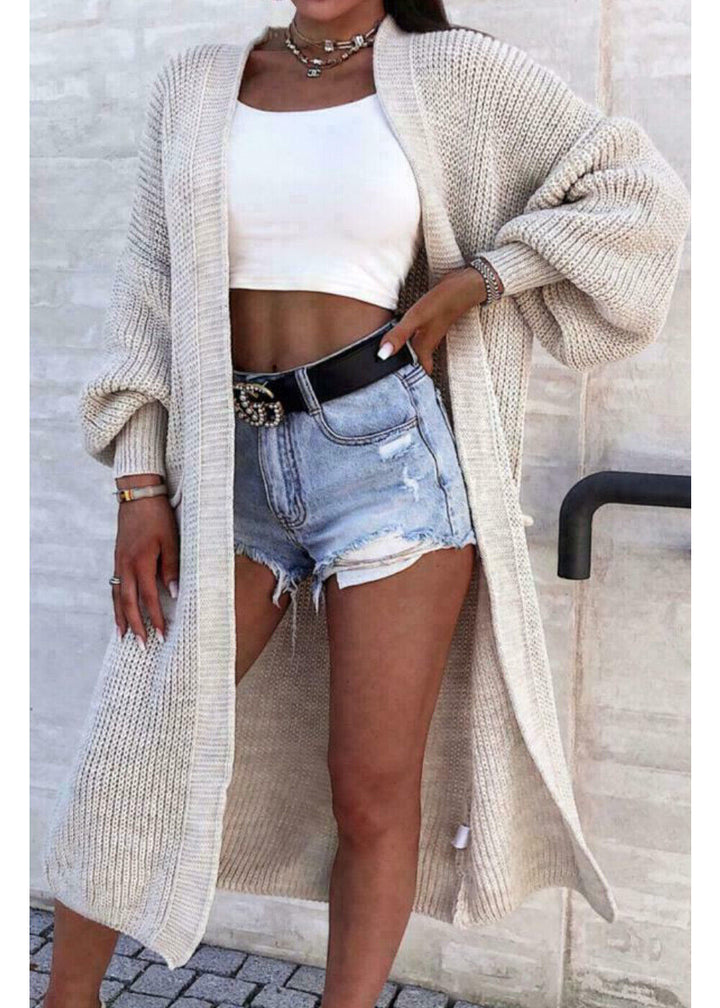 Damernas långstickad jacka med grov maskstruktur och praktiska fickor Eva Jonsson-Eva Jonsson