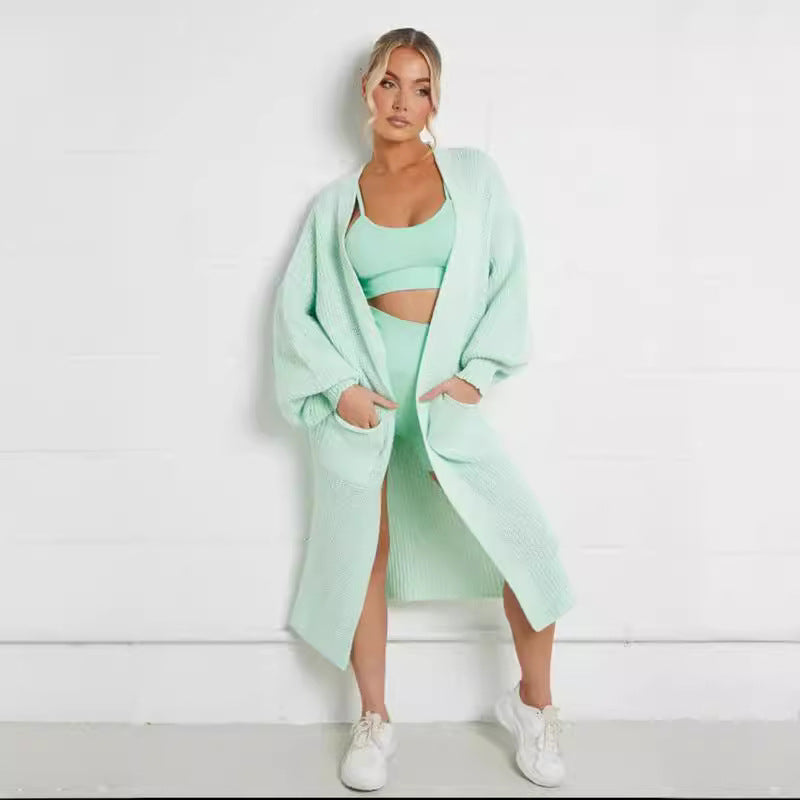 Damernas långstickad jacka med grov maskstruktur och praktiska fickor Eva Jonsson-Eva Jonsson