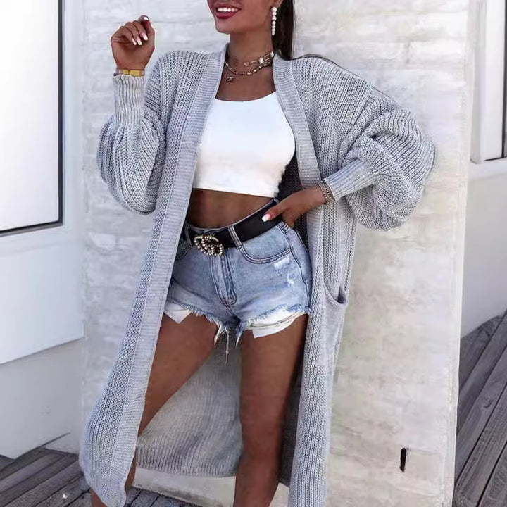 Damernas långstickad jacka med grov maskstruktur och praktiska fickor Eva Jonsson-Eva Jonsson