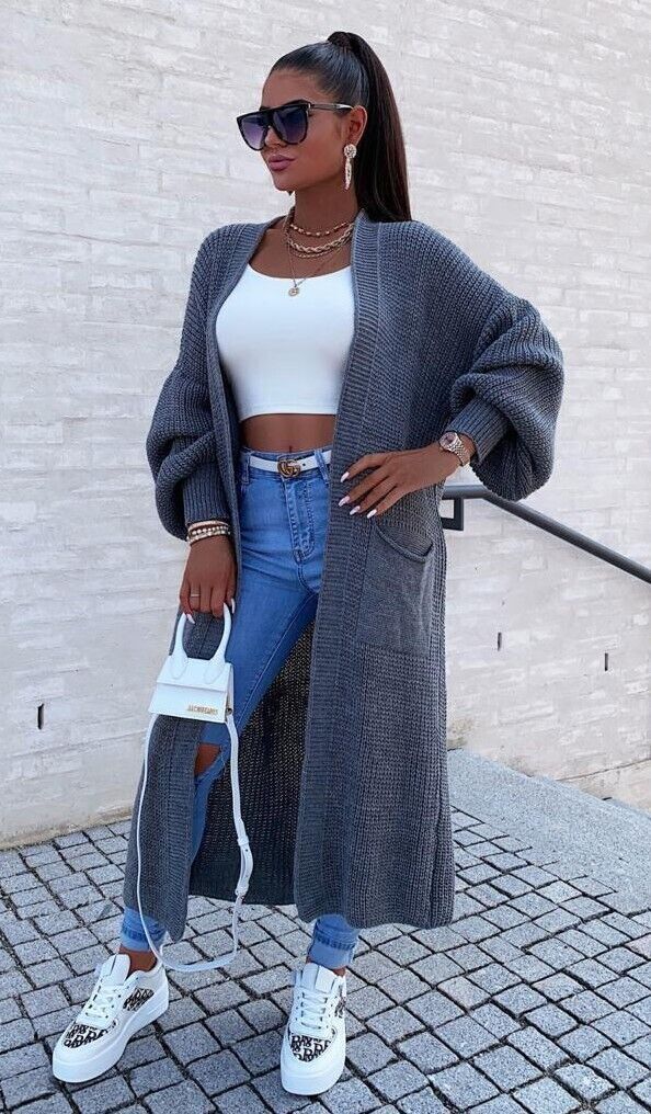 Damernas långstickad jacka med grov maskstruktur och praktiska fickor Eva Jonsson-Eva Jonsson