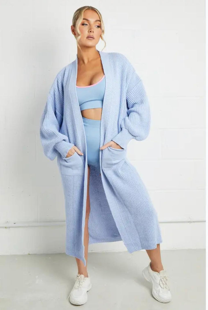 Damernas långstickad jacka med grov maskstruktur och praktiska fickor Eva Jonsson-Eva Jonsson