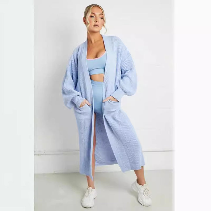 Damernas långstickad jacka med grov maskstruktur och praktiska fickor Eva Jonsson-Eva Jonsson