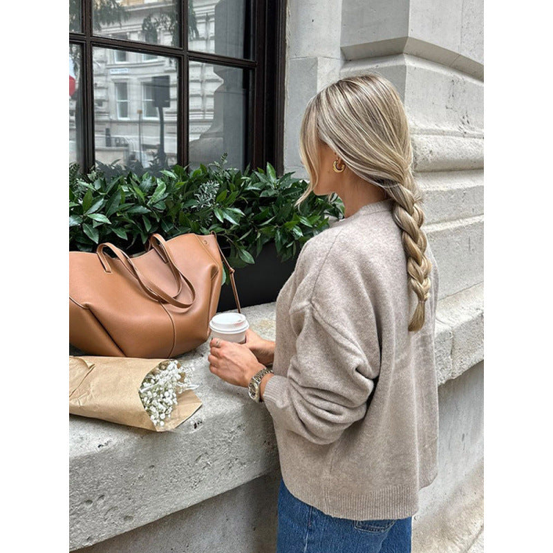 Damernas lätta cardigan med knapppdetaljer och moderiktig snitt Eva Jonsson-Eva Jonsson