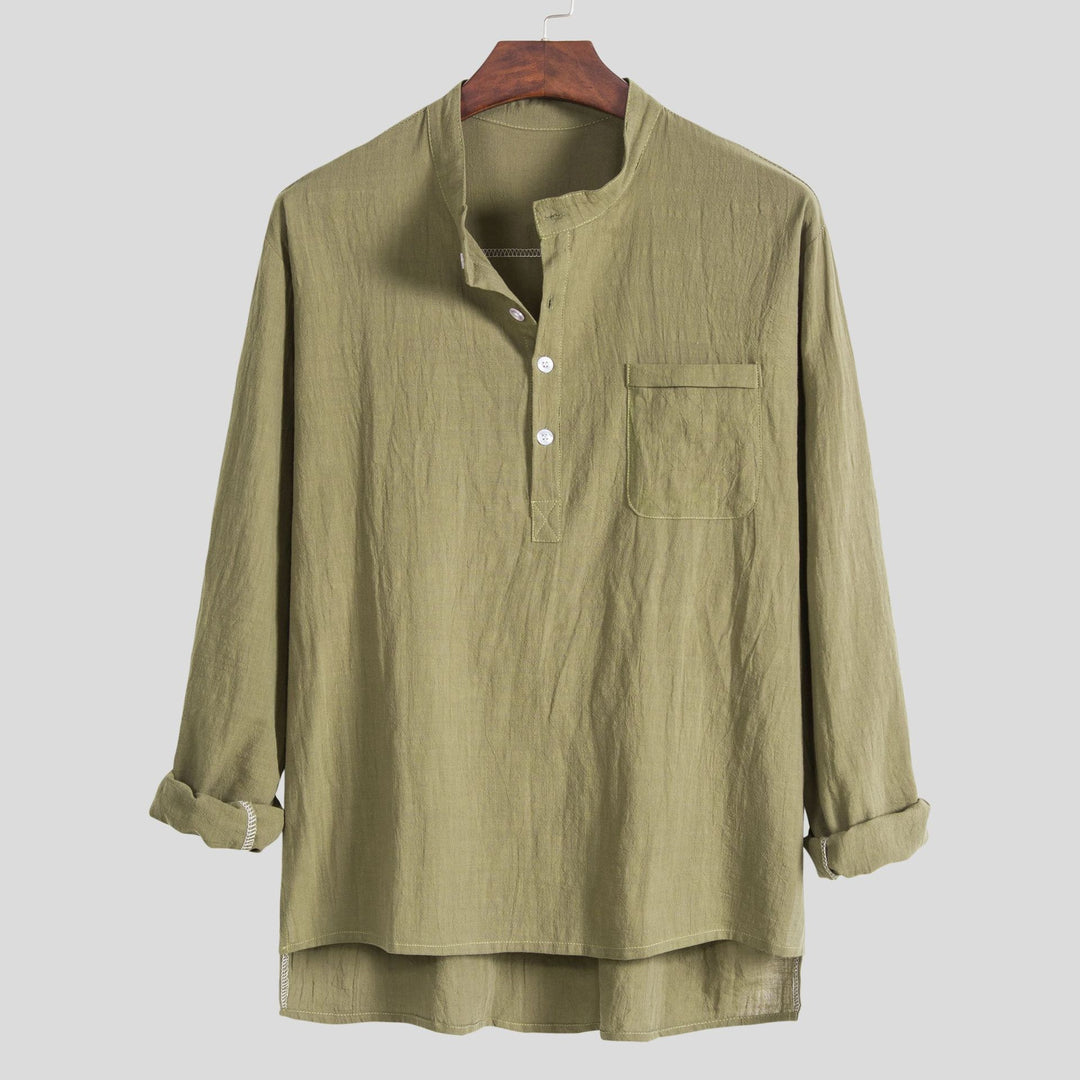 Damernas lätta långärmad blus med modern Henley-utsärning och praktisk bröstficka Mirla-Eva Jonsson