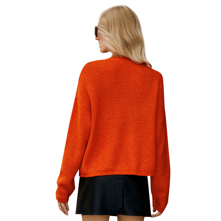 Damernas ledig stickad cardigan med djup V-ringning och knapppdetaljer Eva Jonsson-Eva Jonsson