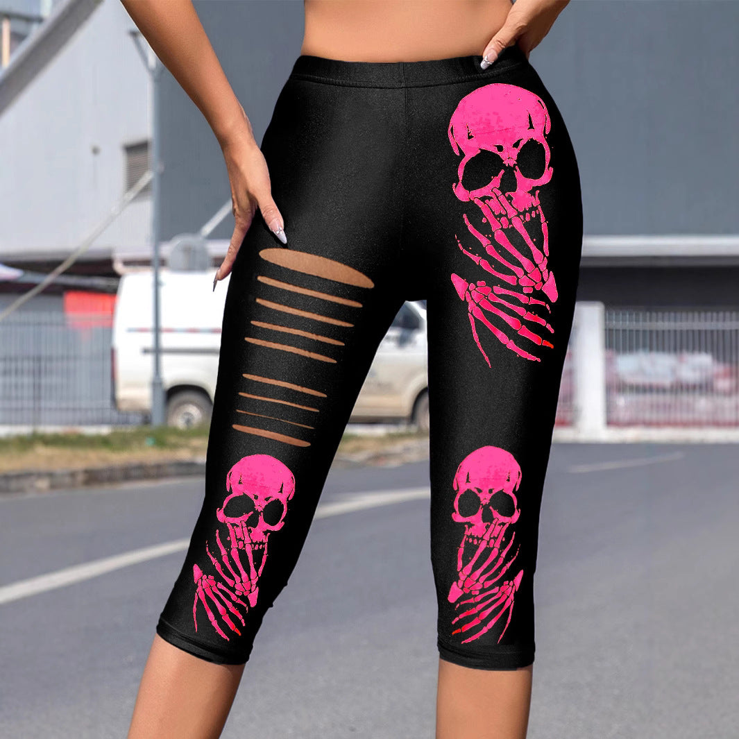 Damernas leggings med iögonfallande dödskalletryck och moderiktiga utklipp Mirla-Eva Jonsson