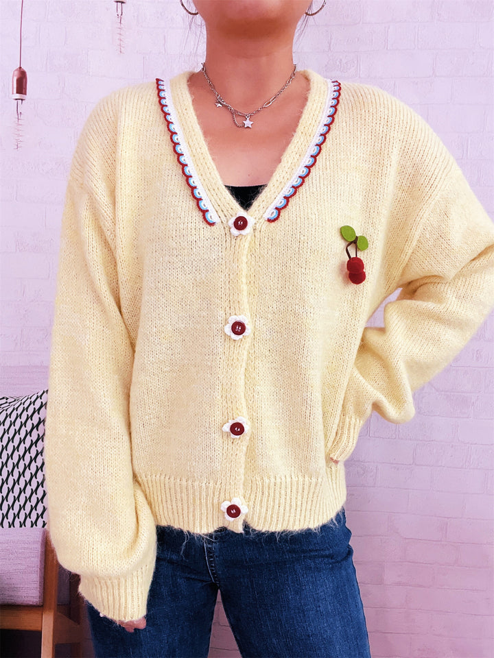 Damernas lekfulla kofta med färgglad knappdesign och hög komfort Eva Jonsson-Eva Jonsson