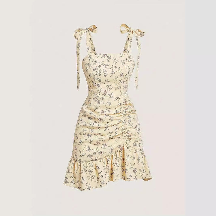 Damernas lekfulla mini-klänning med volangdetaljer och rosetter Eva Jonsson-Eva Jonsson