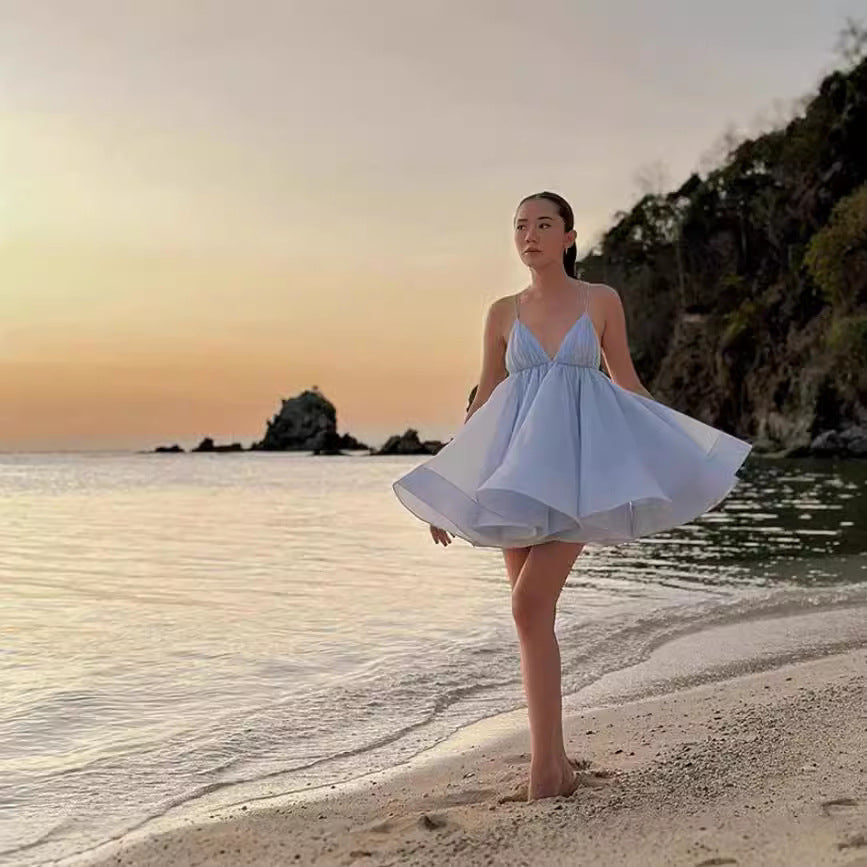 Damernas lekfulla sommarklänning med diskret ryggutskärning och svängande fåll Eva Jonsson-Eva Jonsson