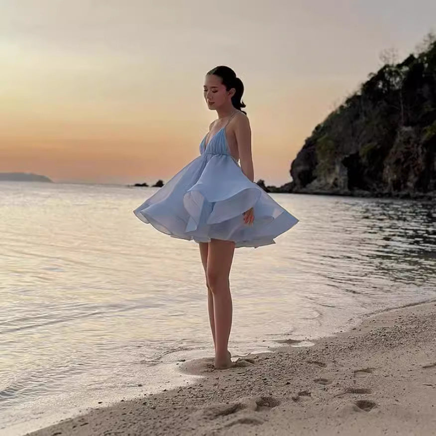 Damernas lekfulla sommarklänning med diskret ryggutskärning och svängande fåll Eva Jonsson-Eva Jonsson