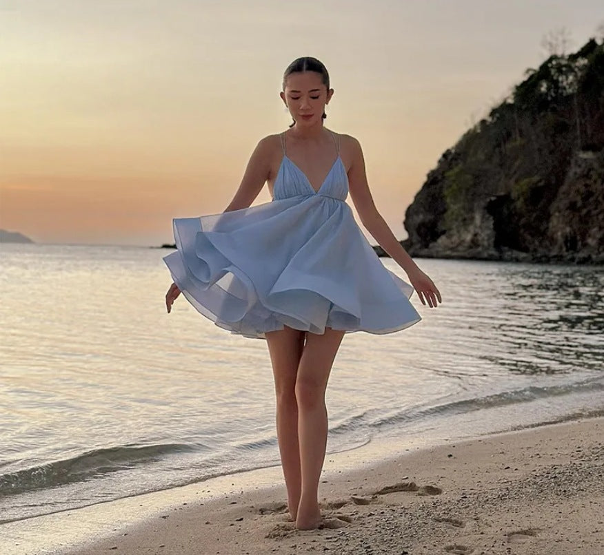 Damernas lekfulla sommarklänning med diskret ryggutskärning och svängande fåll Eva Jonsson-Eva Jonsson