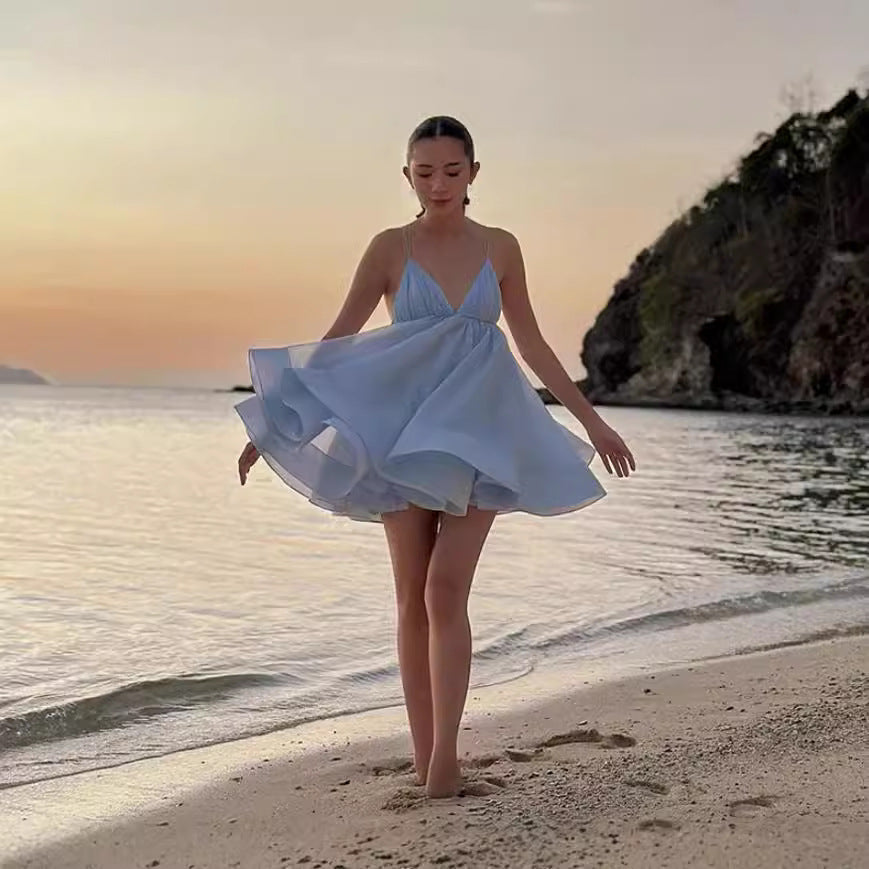 Damernas lekfulla sommarklänning med diskret ryggutskärning och svängande fåll Eva Jonsson-Eva Jonsson