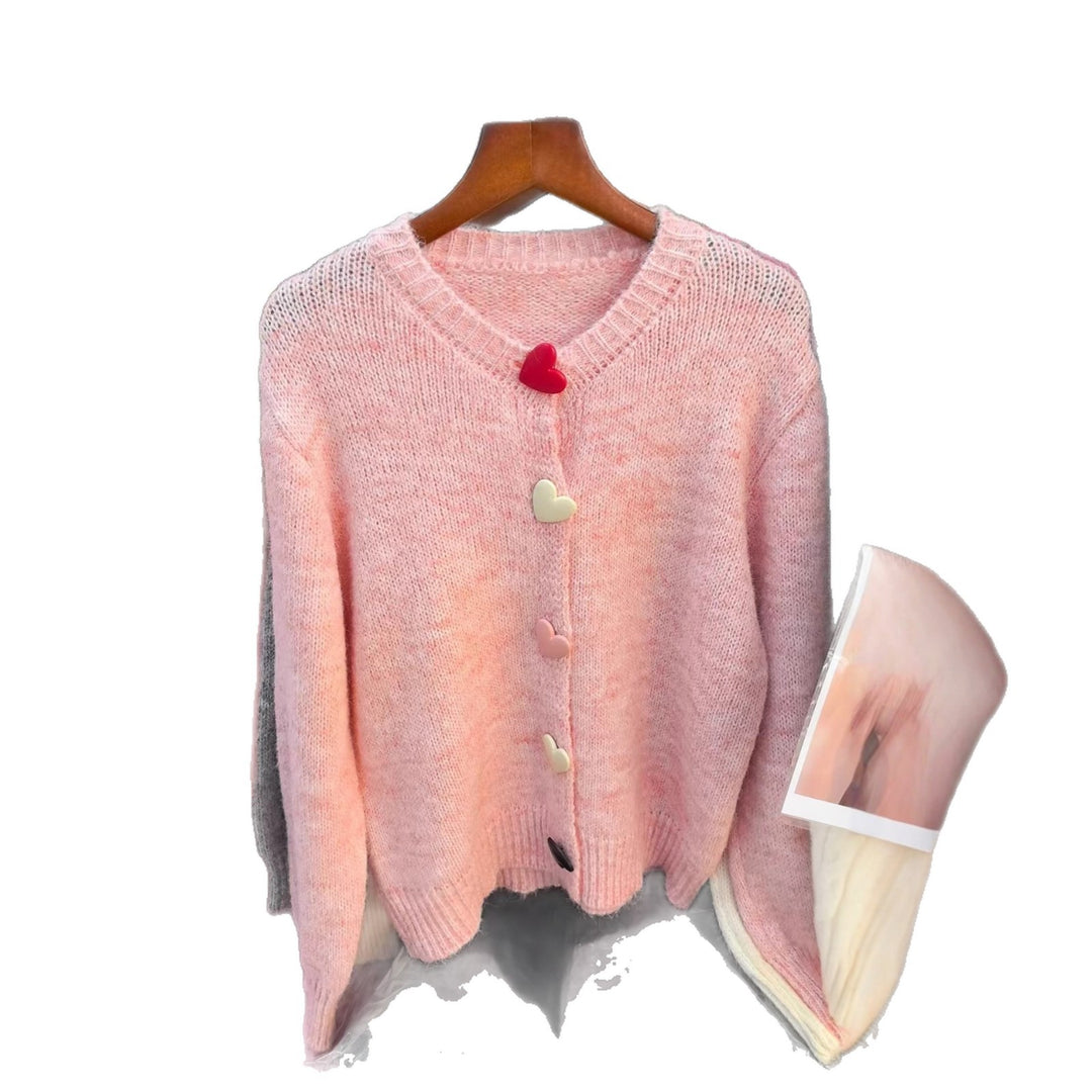 Damernas lösa stickade tröja med hjärtformade knappar och vid passform Eva Jonsson-Eva Jonsson