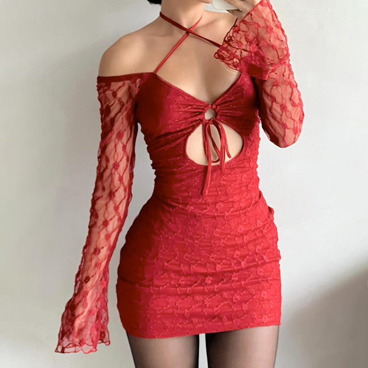 Damernas löst sittande miniklänning med transparenta ärmar och volangdetaljer Mirla-Eva Jonsson
