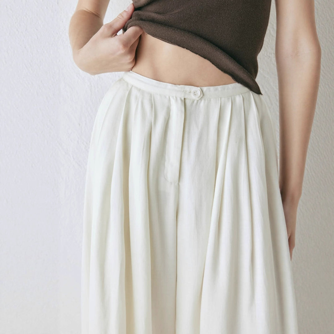 Damernas löst skurna kostymbyxor med elegant plissering Eva Jonsson-Eva Jonsson