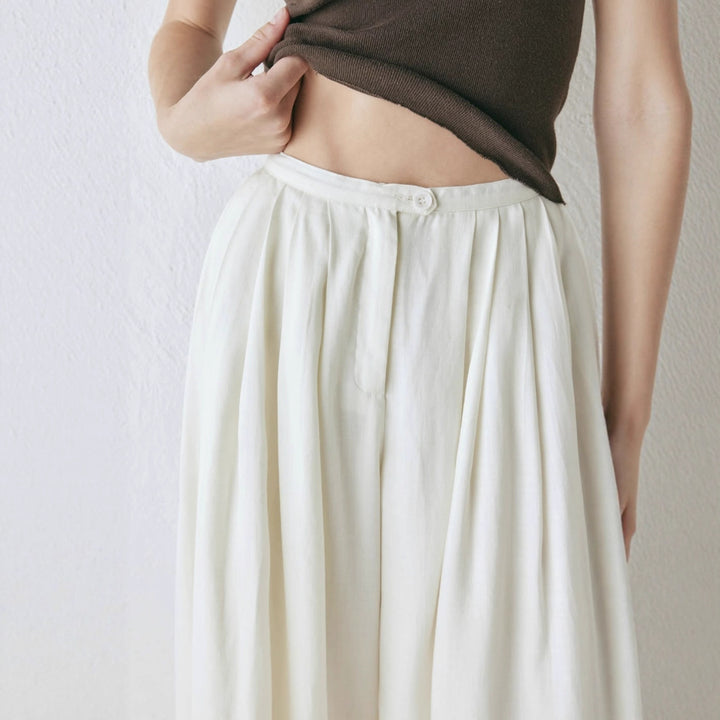 Damernas löst skurna kostymbyxor med elegant plissering Eva Jonsson-Eva Jonsson