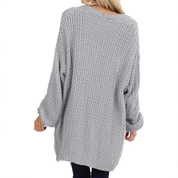 Damernas luftig grovstickad cardigan med vida ärmar och bekväm passform Mirla-Eva Jonsson