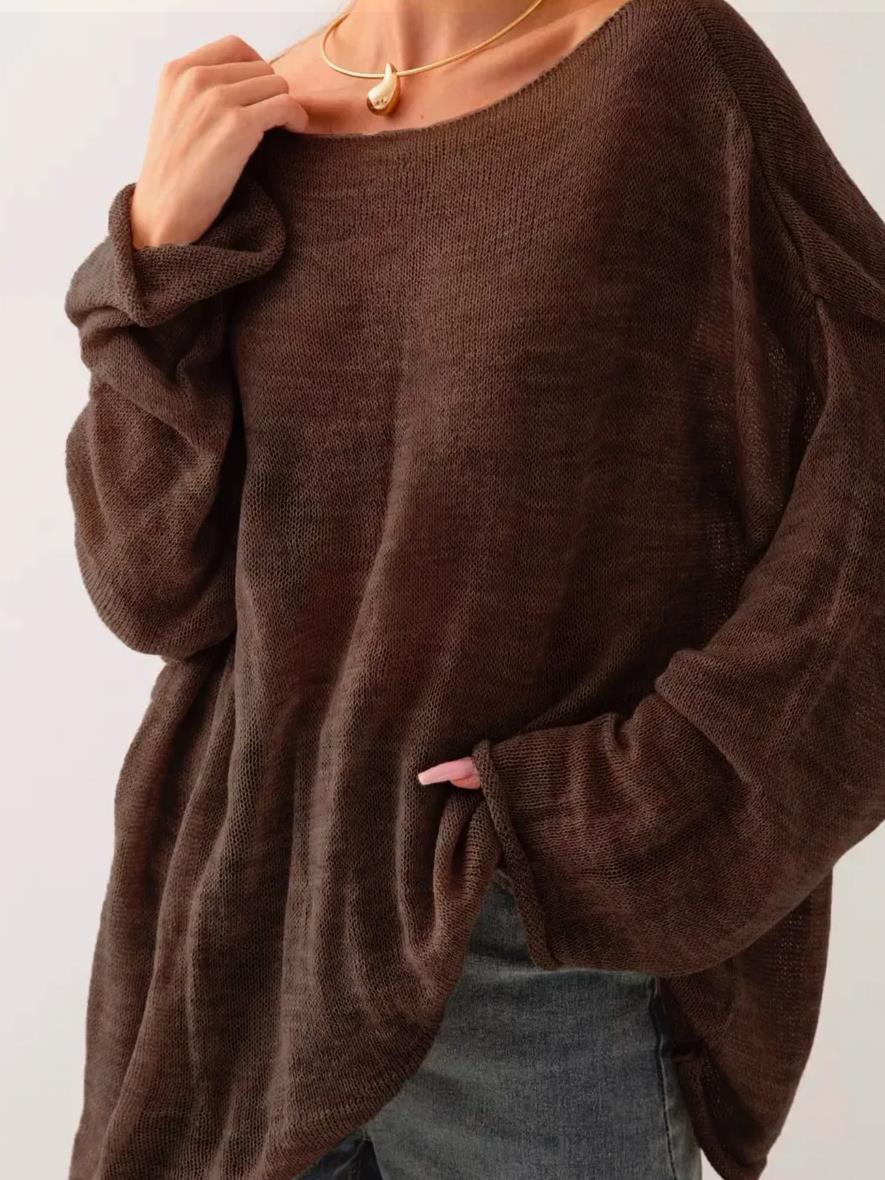 Damernas luftig oversized stickad tröja med vid skärning och transparent tyg Mirla-Eva Jonsson