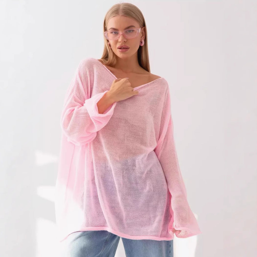 Damernas luftig oversized stickad tröja med vid skärning och transparent tyg Mirla-Eva Jonsson