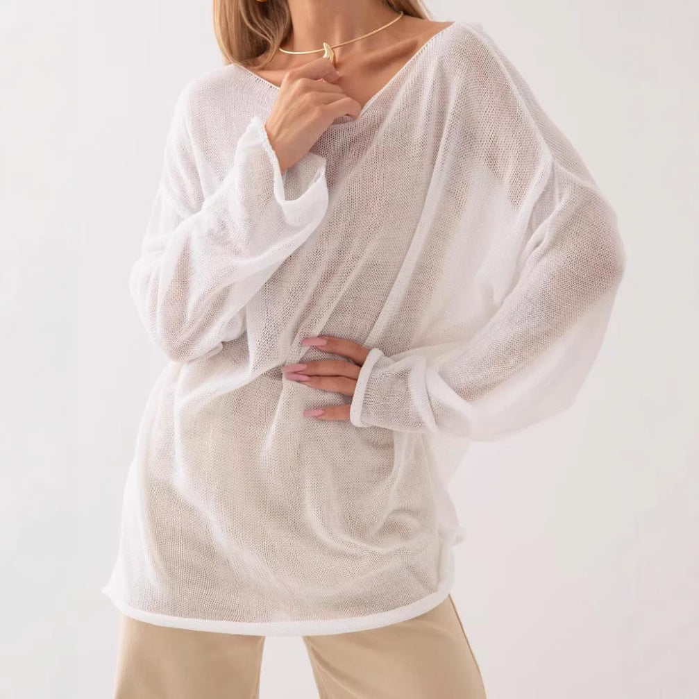 Damernas luftig oversized stickad tröja med vid skärning och transparent tyg Mirla-Eva Jonsson