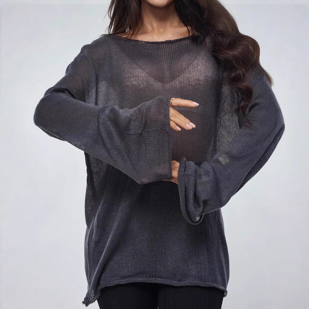 Damernas luftig oversized stickad tröja med vid skärning och transparent tyg Mirla-Eva Jonsson