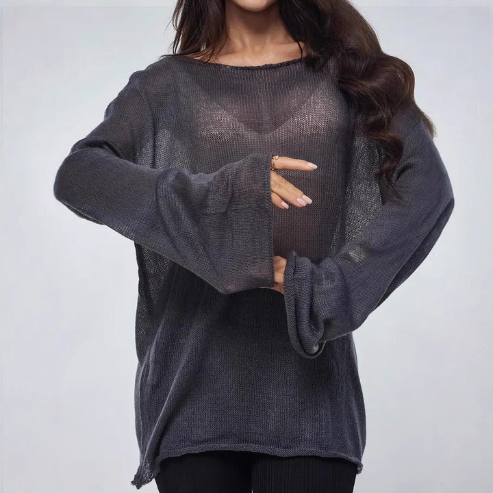 Damernas luftig oversized stickad tröja med vid skärning och transparent tyg Mirla-Eva Jonsson