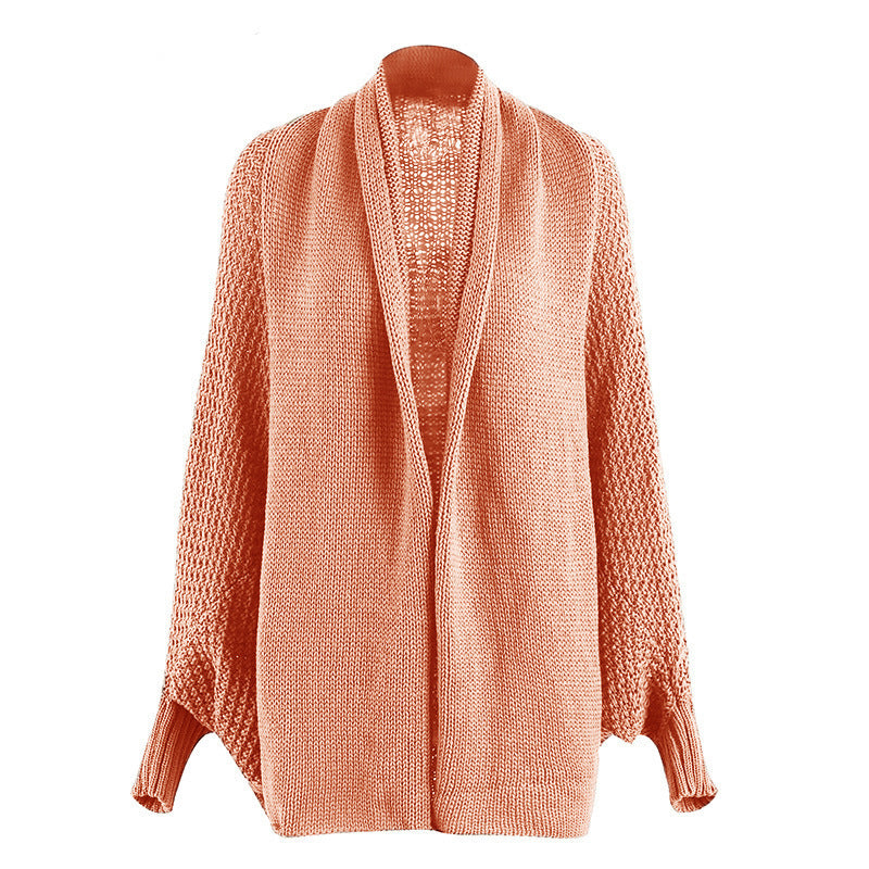 Damernas luftig stickad cardigan med öppen framsida och voluminösa ärmar Eva Jonsson-Eva Jonsson