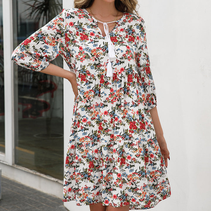 Damernas luftiga blommiga klänningar med volangdetaljer och bindband Eva Jonsson-Eva Jonsson