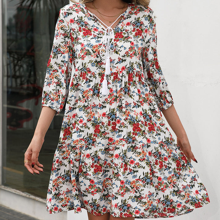 Damernas luftiga blommiga klänningar med volangdetaljer och bindband Eva Jonsson-Eva Jonsson