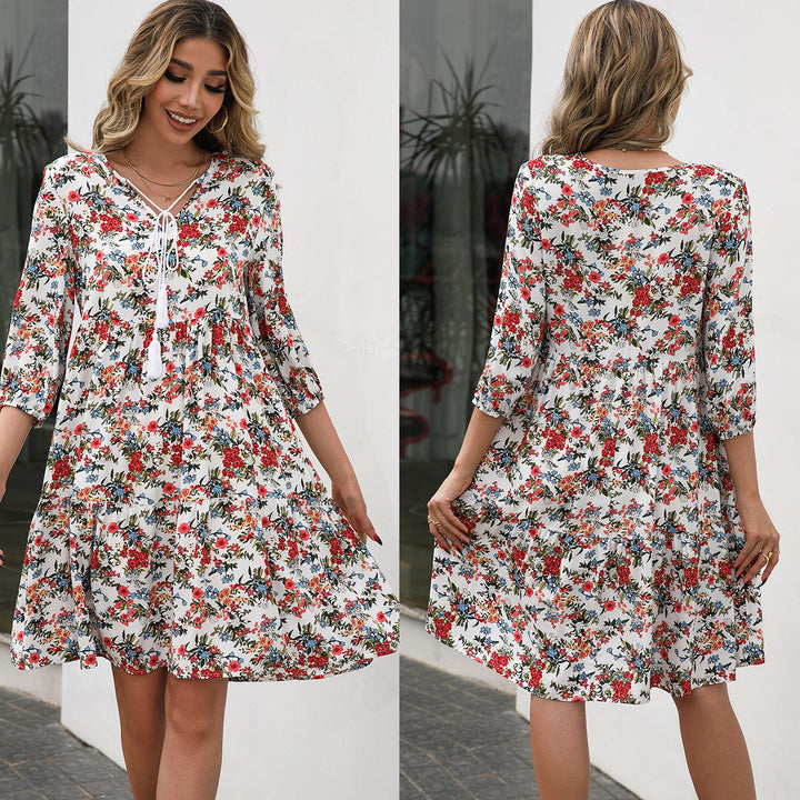 Damernas luftiga blommiga klänningar med volangdetaljer och bindband Eva Jonsson-Eva Jonsson