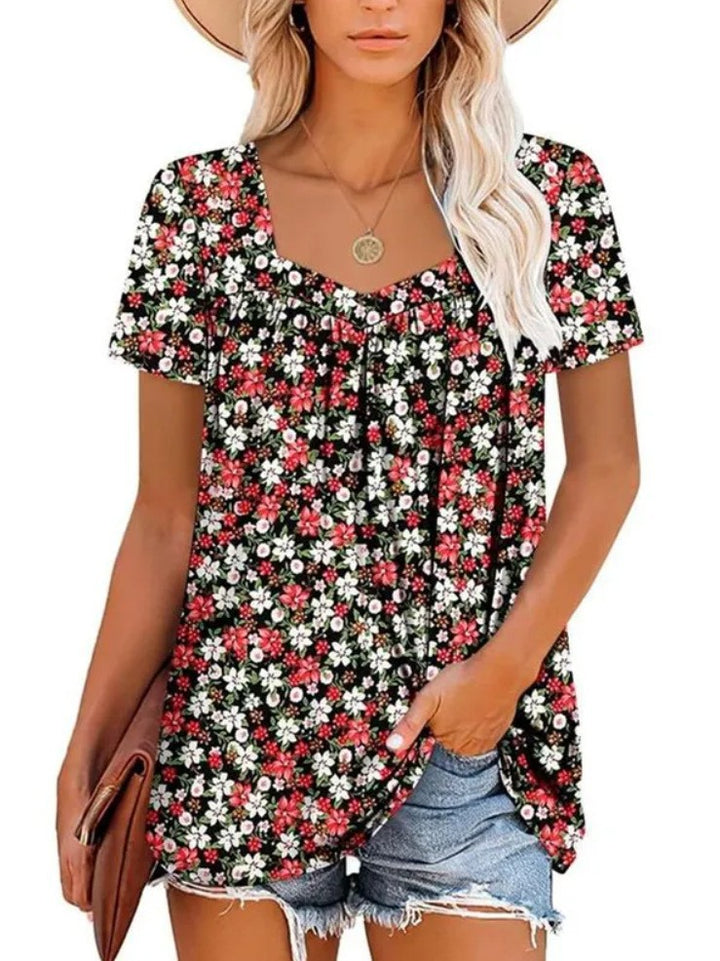 Damernas luftiga kortärmade topp med blommönster Mirla-Eva Jonsson