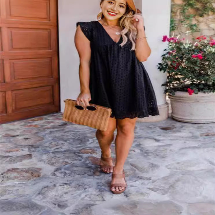 Damernas luftiga midiklänning med romantiska volangdetaljer Eva Jonsson-Eva Jonsson